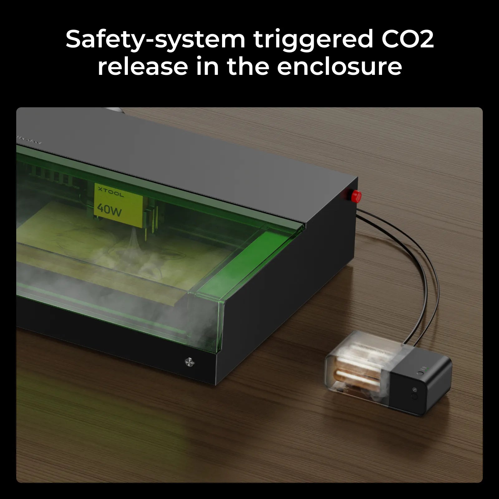 El kit contra incendios xTool liberando CO2 dentro de la carcasa cerrada de una maquina laser